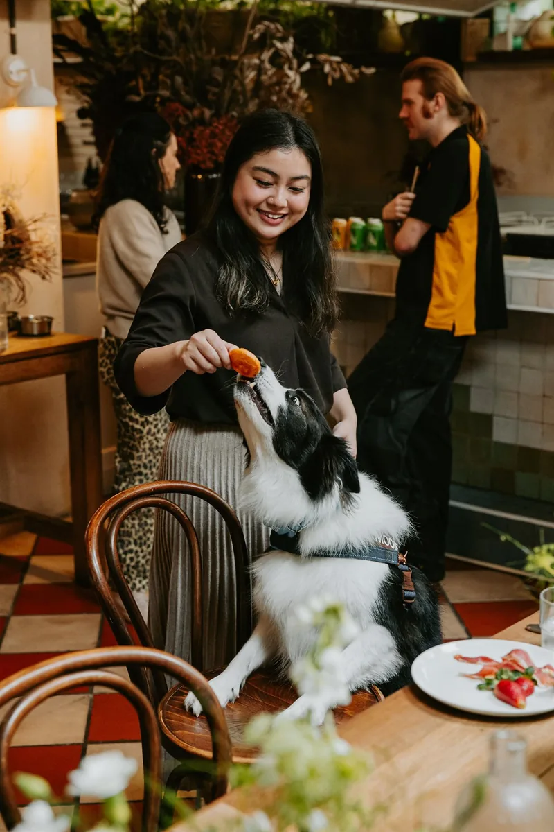 Grace and Mooie filming content at a café